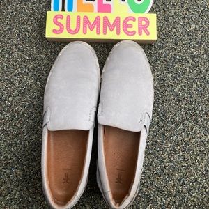 Powder blue suede loafer.